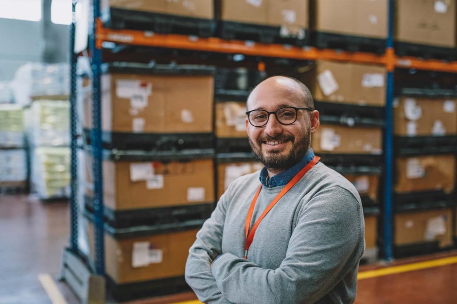 chief-operating-officer-in-warehouse-smiling-1