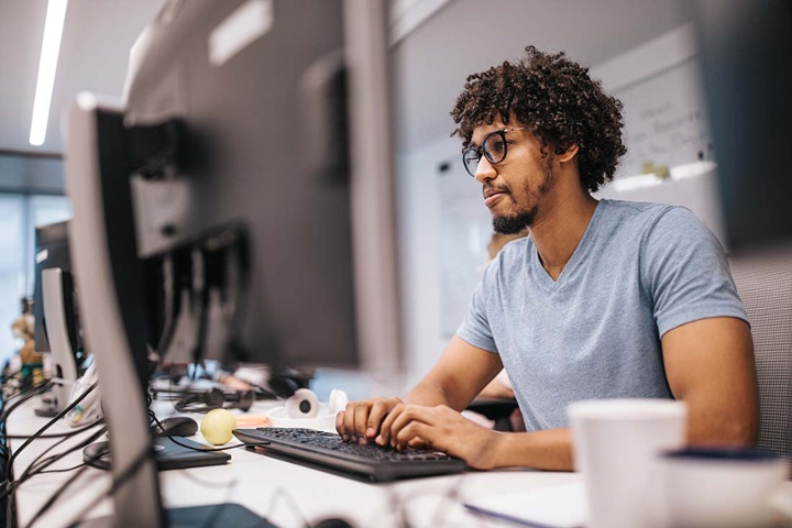 male-programmer-at-desktop-1